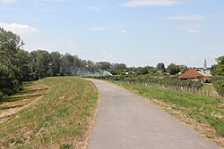 Flood defence barrier with Reformed Church in distance