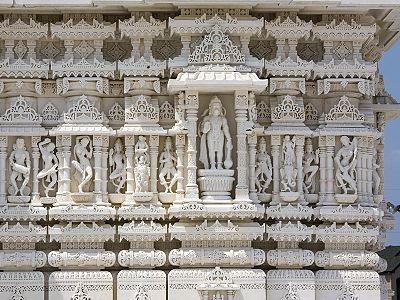 Exterior carvings surrounding the mandir[33]