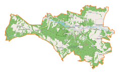 Mapa konturowa gminy Krasnobród, blisko centrum na prawo znajduje się punkt z opisem „Parafia Nawiedzenia Najświętszej Maryi Panny”