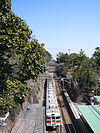 A train on the Sanyo Electric Railway Main Line at Sumaura-Koen Station in 2006