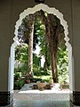 View of the fountain and trees in the courtyard garden of the palace