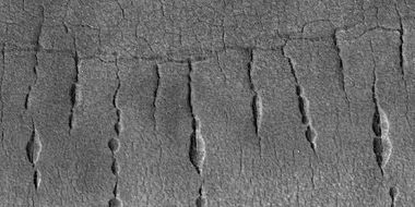 Close view of lines of pits, as seen by HiRISE under HiWish program