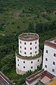 Doubled-layered, cylindrical tower.