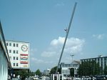 Himmelsstürmer (Man walking to the sky), realized for the Documenta in 1992 by Jonathan Borofsky, in the station square.