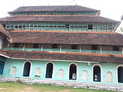 Miskal Mosque has three-storeyed gabled roofs with windows, which offer an alternative to minarets in traditional Kerala style.