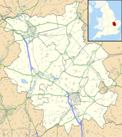 Mapa konturowa Cambridgeshire, na dole znajduje się punkt z opisem „Newnham College”