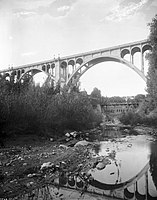 1914 Colorado Street Bridge just completed and the Scoville Bridge, later washed away by a flood.