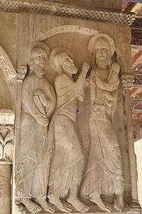 Jünger von Emmaus und Christus als Pilger mit Schultertasche, Pilgerhut und Jakobsmuschel