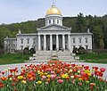 Image 1The gold leaf dome of the Vermont State House in Montpelier is visible for many miles around the city. This is the third State House on the site, and like the second, was built in the Greek Revival architectural style. It was completed in 1857. Montpelier became the state capital in 1805. (from History of Vermont)