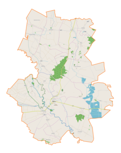 Mapa konturowa gminy Wiślica, blisko centrum na lewo znajduje się punkt z opisem „Sielec”