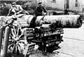 Dismantling of a heavy artillery piece after World War I. Gun carriage with pedrail wheels.