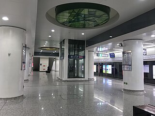 Aolinpikegongyuan Station