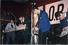 Four members of ORI performing on stage at the Metro Cafe in Washington DC, 1998.