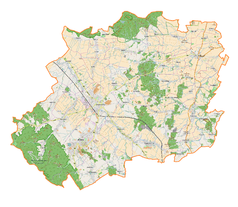 Mapa konturowa powiatu dzierżoniowskiego, blisko centrum na prawo znajduje się punkt z opisem „Gilów”