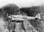 A No. 30 Squadron Beaufighter flying through the Owen Stanley Range in 1942