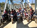 Locals crossing the bridge