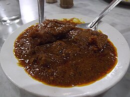 Kosha Mangsho, a spicy and popular Bengali gravy dish made with mutton (goat meat).