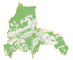 Mapa konturowa gminy Milówka, w centrum znajduje się punkt z opisem „Parafia Najświętszego Imienia Maryi w Kamesznicy”