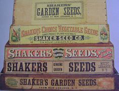 Stack of reproduction replicas of Shaker wooden display boxes