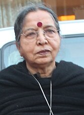 A photograph of a old lady with black dress