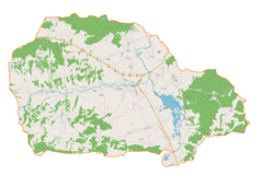 Mapa konturowa gminy Pilzno, w centrum znajduje się punkt z opisem „Zespół klasztorny karmelitów w Pilźnie”