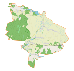 Mapa konturowa gminy Przyrów, blisko centrum u góry znajduje się punkt z opisem „Kościół Najświętszej Maryi Panny Szkaplerznej i Świętej Doroty”