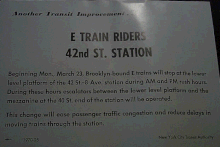 E TRAIN RIDERS / 42nd ST. STATION / Another Transit Improvement / Beginning Mon., March 23, Brooklyn-bound E trains will stop at the lower / level platform at the 42 St.–8 Ave. station during AM and PM rush hours. / During these hours escalators between the lower level platform and the / mezzanine at the 40 St. end of the station will be operated. / This change will ease passenger traffic congestion and reduce delays / in moving trains through this station. / 1070-25 / New York City Transit Authority