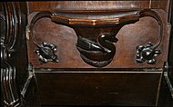 Magdalen College, Oxford: a swan, flanked by foliate "supporters"