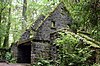 Stone structure where the Wildwood Trail meets the Lower Macleay Trail along Balch Creek in Macleay Park