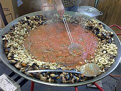 Escargot in tomatensaus met calamares en mosselen