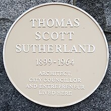 A circular commemorative plaque bearing the inscription 'Thomas Scott Sutherland 1899 – 1964 Architect, City Councillor and Entrepreneur lived here.'