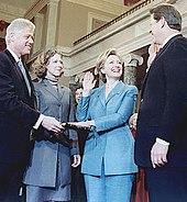 Al Gore administering Hillary Clinton's oath of office as Bill and Chelsea look on