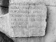 Schlacht bei Dornach vom 22. Juli 1499, Tafel-Inschrift von Jakob Probst (17. August 1880 in Reigoldswil, Basel-Landschaft; † 28. März 1966 in Vira, Tessin) Bildhauer
