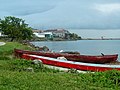 Boats rest on the shore in Punta Gorda, Belize.