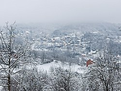 Panorama shot of the village of Velika Sejanica, covered with light snow