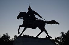 Statue of General Kang in silhouette.