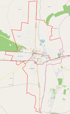 Mapa konturowa Gostynia, blisko centrum na dole znajduje się punkt z opisem „Parafia Ducha Świętego i Najświętszego Serca Pana Jezusa”