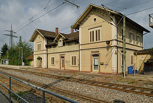 Two-story building with gabled roof