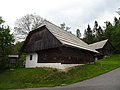 Traditional Pohorje wooden house in Skomarje