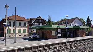 Platform with flat-roofed waiting area