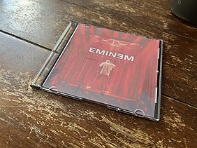 Picture of a CD with the "I am A Celebrity" album cover on it.