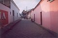 Streetscene. Traditional Spanish colonial houses face into a courtyard/garden for security reasons.