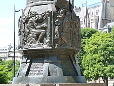 Two of the bas-reliefs on the Mickievicz monument. "Old Halban" to the left and "The Captives" to the right.