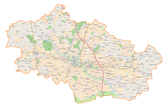 Mapa konturowa powiatu kutnowskiego, w centrum znajduje się punkt z opisem „AMZ-Kutno S.A.”