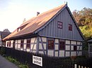 Tuchmacherhaus mit Nebengebäude (heute Museumshof „Strohhaus“)