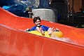 Image 4Boy riding a water tube slide at The Colony Park in The Colony, Texas (from Water slide)