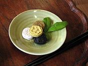 Dasik, a variety of hangwa, is made from nongmal (which is starch made from potatoes, sweet potatoes or soaked mung beans), pine pollen singamchae, black sesame, honey, flour from rice or other grains, nuts and/or herbs.[5][6][7]