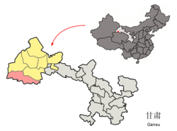 Location of Aksay Kazak Autonomous County (pink) within Jiuquan City (yellow), Gansu Province (light grey) and the People's Republic of China (dark grey)