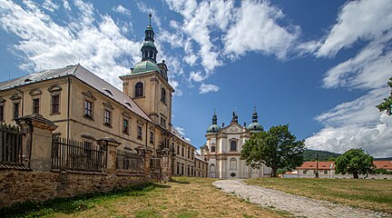 Abbot's residence with a tower and the abbey church in the background