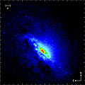 ESO: Infrarotaufnahme bei 2,2 µm – das supermassive Schwarze Loch im Zentrum tritt hervor.